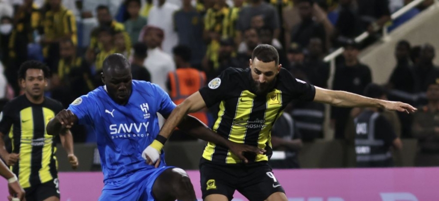 Saudi's Al Ittihad players celebrate trophy after winning the AFC Champions  League final against UAE's Al Ain at Prince Abdullah Al Faisal Stadium in  Jeddah, Saudi Arabia, late Saturday, Nov.5, 2005. Al