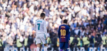 أرشيفية - ليونيل ميسي وكريستيانو رونالدو من كلاسيكو سابق بين برشلونة وريال مدريد (Getty)