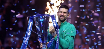 أرشيفية - نجم التنس الصربي نوفاك ديوكوفيتش في مفكرة ميلان الإيطالي (X- UniversTennis) ون ون winwin