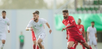 جانب من مباراة الأهلي طرابلس والاتحاد في الدوري الليبي الموسم الماضي