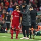 أرشيفية - ومحمد صلاح لاعب نادي ليفربول مع مدربه يورغن كلوب (Getty)